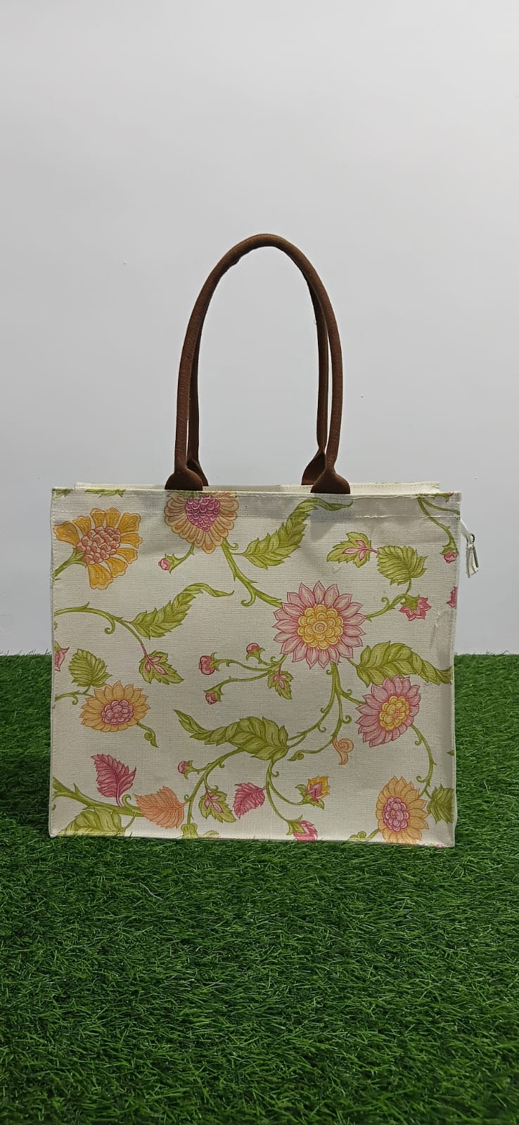 Pastel floral hand bag with brown handles