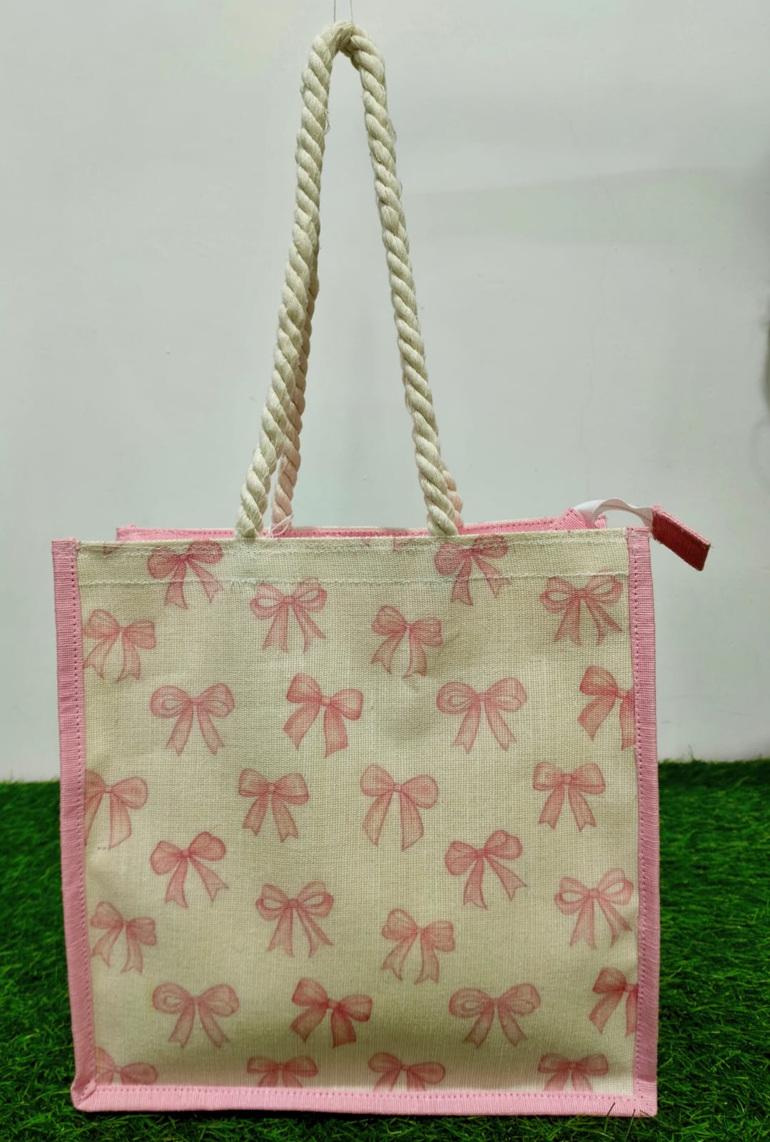pink bow printed  hand bag