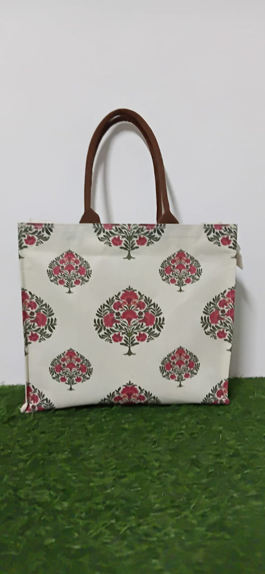Red floral hand bag with brown handles